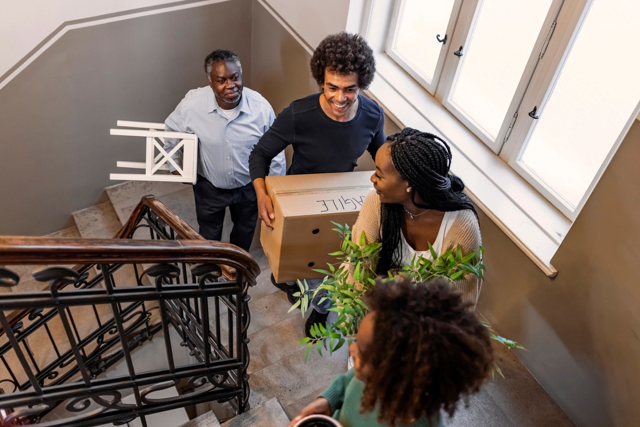 Family preparing for a move with packed boxes
