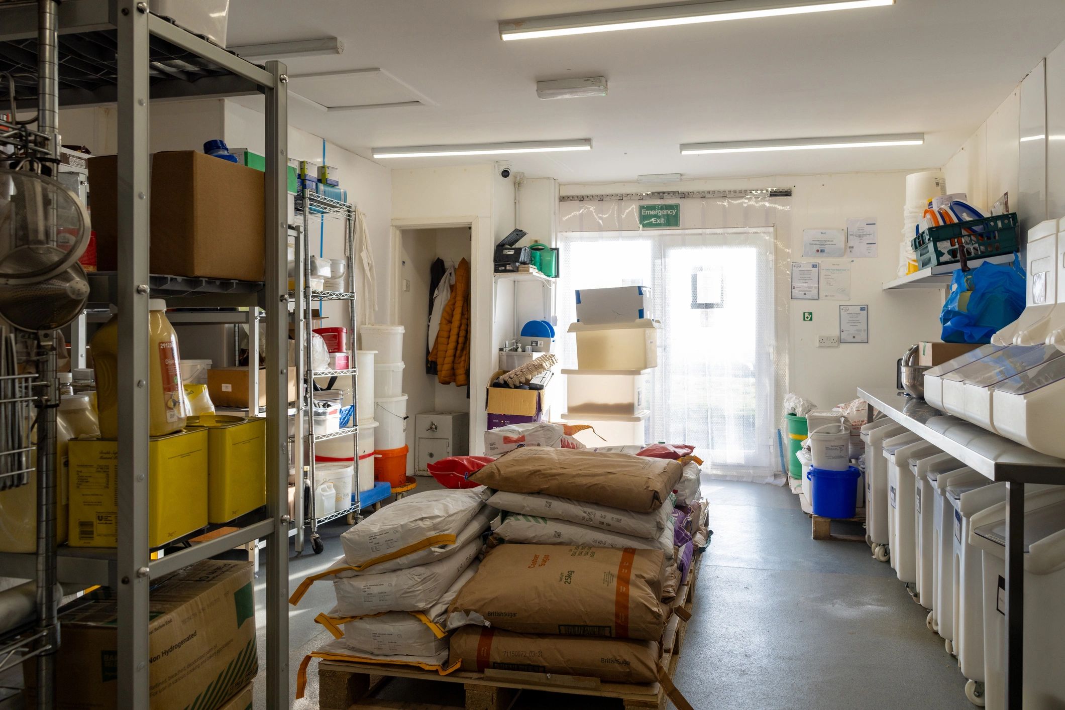 Organized storage space with boxes and supplies